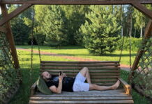 lazy morning man with smartphone 2021 08 29 04 36 06 utc scaled e1653206850723